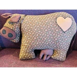 Adorable Cow with small bell on neck and utters